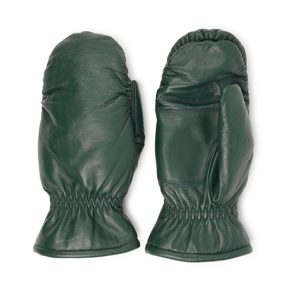 The Amalfi mittens are crafted from soft, premium leather and lined with cozy terry fleece for ultimate warmth and comfort. Designed for a sleek, timeless look, they feature an elastic wrist for a secure fit. Perfect for cold days, these luxurious mittens combine style and practicality with ease.