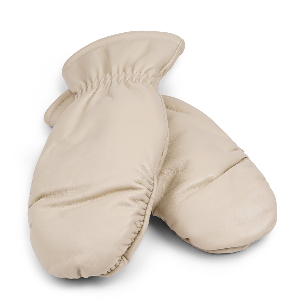 The Amalfi mittens are crafted from soft, premium leather and lined with cozy terry fleece for ultimate warmth and comfort. Designed for a sleek, timeless look, they feature an elastic wrist for a secure fit. Perfect for cold days, these luxurious mittens combine style and practicality with ease.