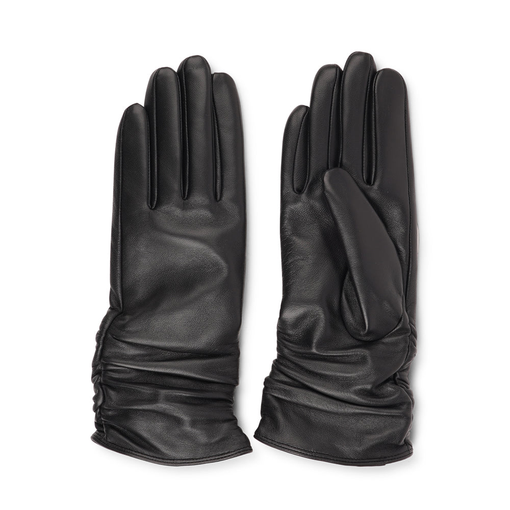 The Asti gloves are crafted from supple leather and lined with luxurious cashmere, offering both elegance and warmth.

Designed with a feminine touch, these gloves provide a sleek and sophisticated look while ensuring superior comfort during colder days. Perfect for adding a touch of refinement to any winter outfit.