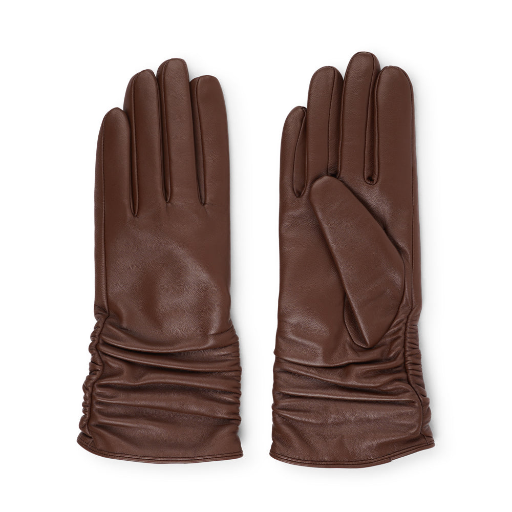 Lovelies Studio - Denmark - The Asti gloves are crafted from supple leather and lined with luxurious cashmere, offering both elegance and warmth.

Designed with a feminine touch, these gloves provide a sleek and sophisticated look while ensuring superior comfort during colder days. Perfect for adding a touch of refinement to any winter outfit.