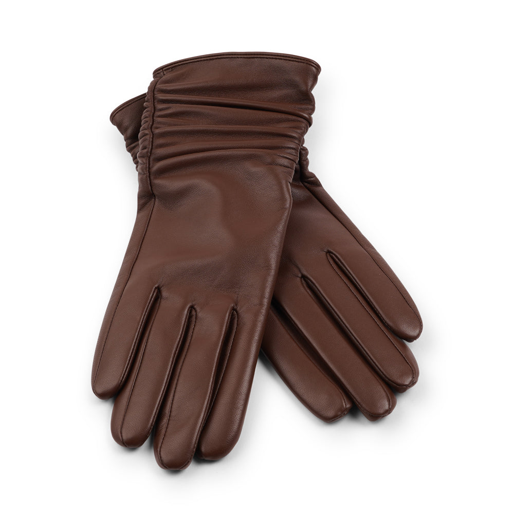 Lovelies Studio - Denmark - The Asti gloves are crafted from supple leather and lined with luxurious cashmere, offering both elegance and warmth.

Designed with a feminine touch, these gloves provide a sleek and sophisticated look while ensuring superior comfort during colder days. Perfect for adding a touch of refinement to any winter outfit.