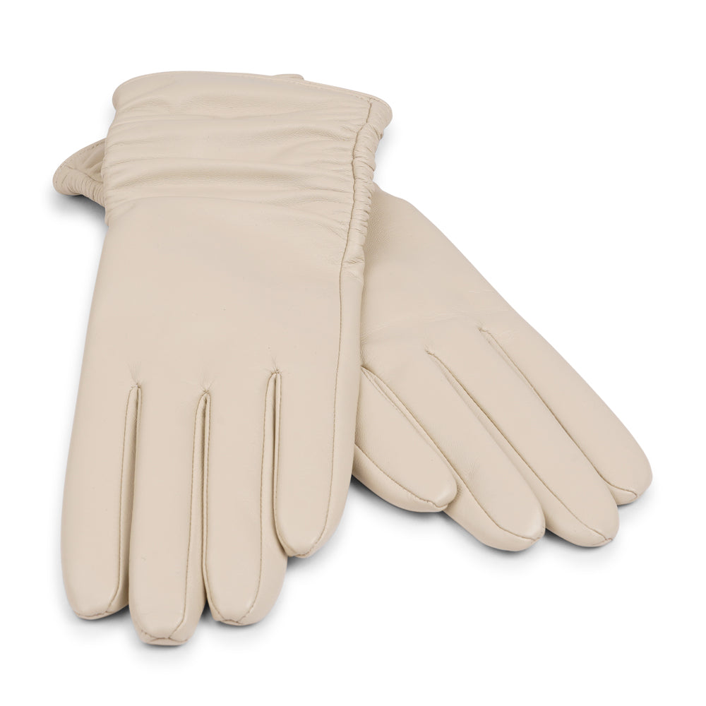 Lovelies Studio - Denmark - The Asti gloves are crafted from supple leather and lined with luxurious cashmere, offering both elegance and warmth.

Designed with a feminine touch, these gloves provide a sleek and sophisticated look while ensuring superior comfort during colder days. Perfect for adding a touch of refinement to any winter outfit.