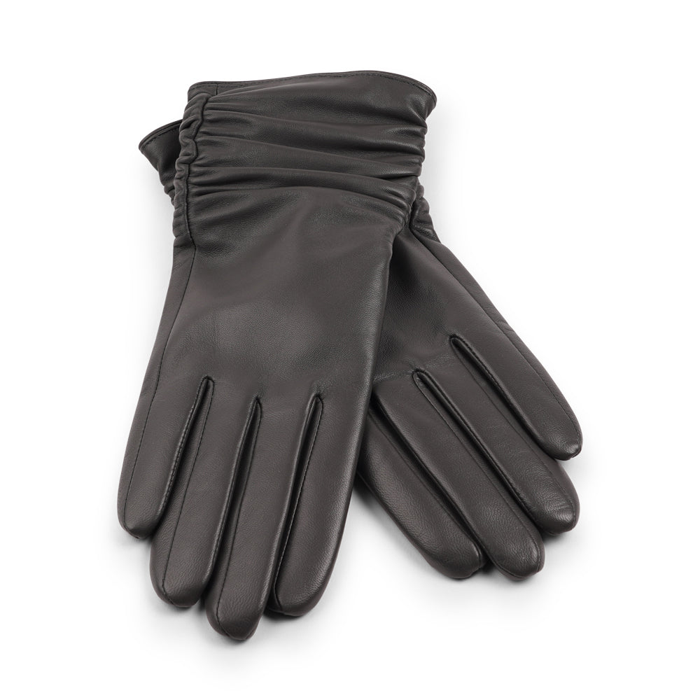 Lovelies Studio - Denmark - The Asti gloves are crafted from supple leather and lined with luxurious cashmere, offering both elegance and warmth.

Designed with a feminine touch, these gloves provide a sleek and sophisticated look while ensuring superior comfort during colder days. Perfect for adding a touch of refinement to any winter outfit.