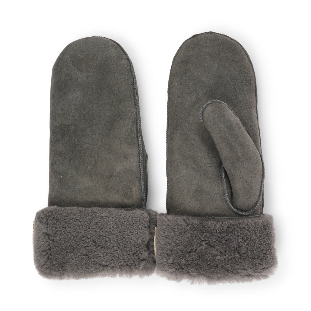 The cozy Belukta mittens are made of 100% Australian double faced shearling.


The palm and upper are soft sheep skin and the beautiful cuff and the lining are made of curly sheep fur. The thumb is made with only one side sawing for the best comfort and style.

Our Belukta mittens are extra long which means that you can fold and wear them in 4 different ways.

with a larger and around 7 cm wide cuff
A shorter 4 cm cuff which gives the mittens a lightly different look.
A super short 1 cm cuff which gives you