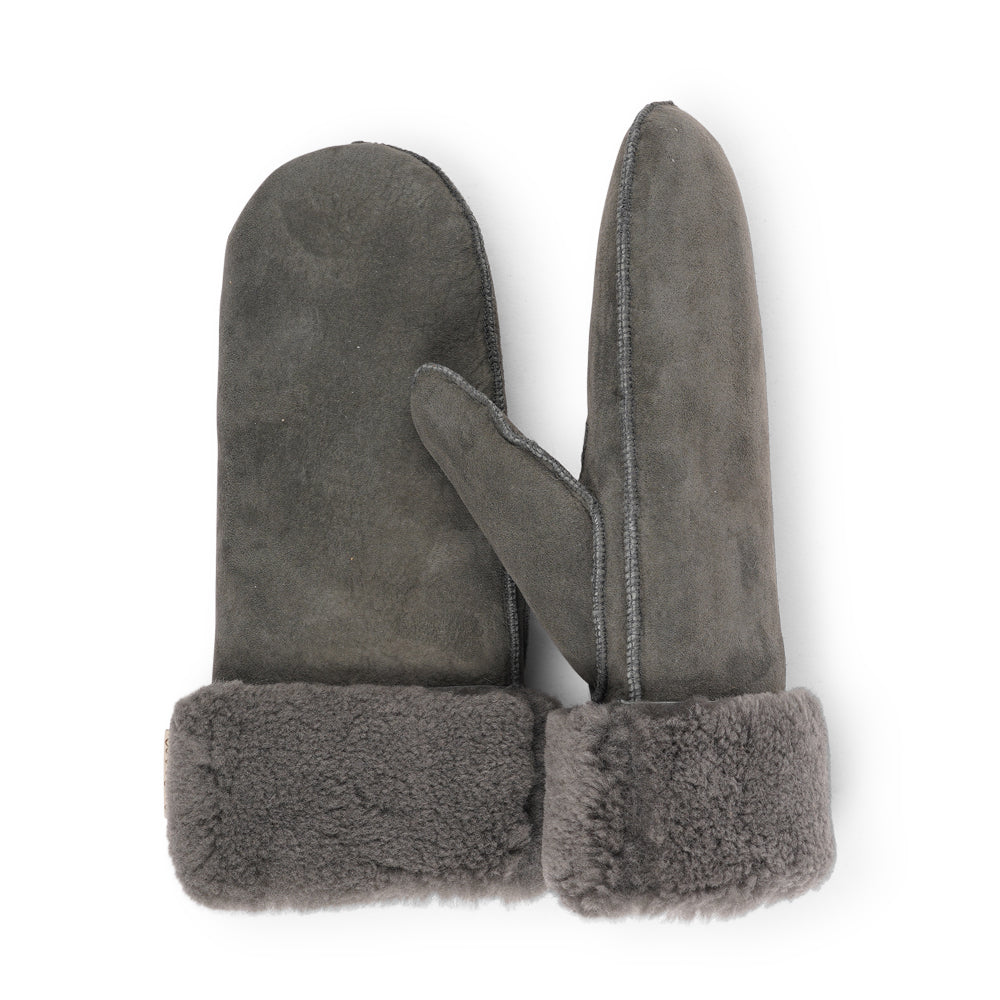 The cozy Belukta mittens are made of 100% Australian double faced shearling.


The palm and upper are soft sheep skin and the beautiful cuff and the lining are made of curly sheep fur. The thumb is made with only one side sawing for the best comfort and style.

Our Belukta mittens are extra long which means that you can fold and wear them in 4 different ways.

with a larger and around 7 cm wide cuff
A shorter 4 cm cuff which gives the mittens a lightly different look.
A super short 1 cm cuff which gives you