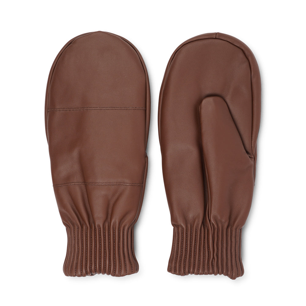 The Bergamo mittens are crafted from soft, premium leather and lined with cozy terry fleece for ultimate warmth and comfort.

Designed for a sleek, timeless look, they feature an elastic wrist for a secure fit. Perfect for cold days, these luxurious mittens combine style and practicality with ease.