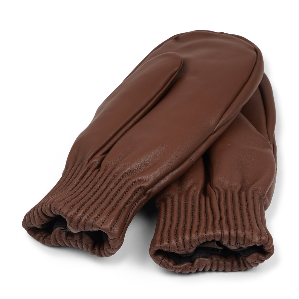 The Bergamo mittens are crafted from soft, premium leather and lined with cozy terry fleece for ultimate warmth and comfort.

Designed for a sleek, timeless look, they feature an elastic wrist for a secure fit. Perfect for cold days, these luxurious mittens combine style and practicality with ease.