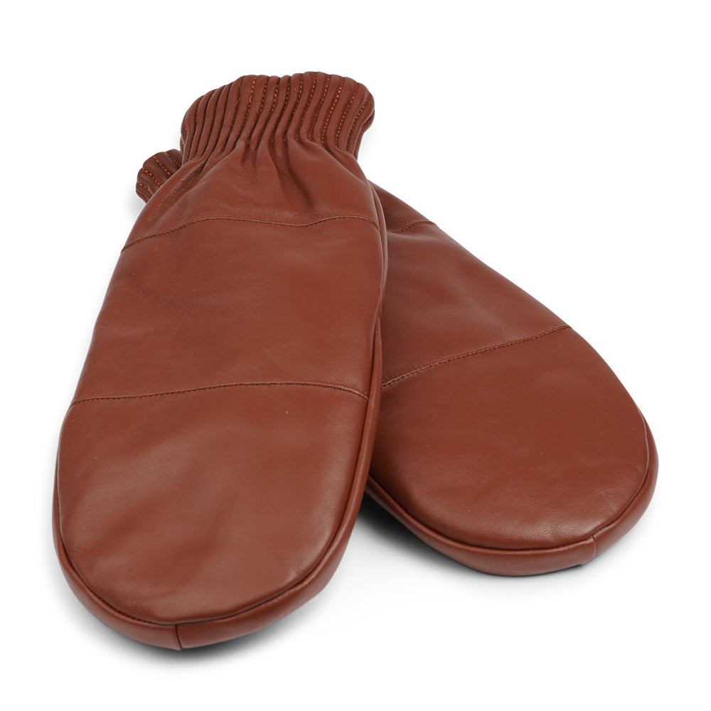 The Bergamo mittens are crafted from soft, premium leather and lined with cozy terry fleece for ultimate warmth and comfort.

Designed for a sleek, timeless look, they feature an elastic wrist for a secure fit. Perfect for cold days, these luxurious mittens combine style and practicality with ease.