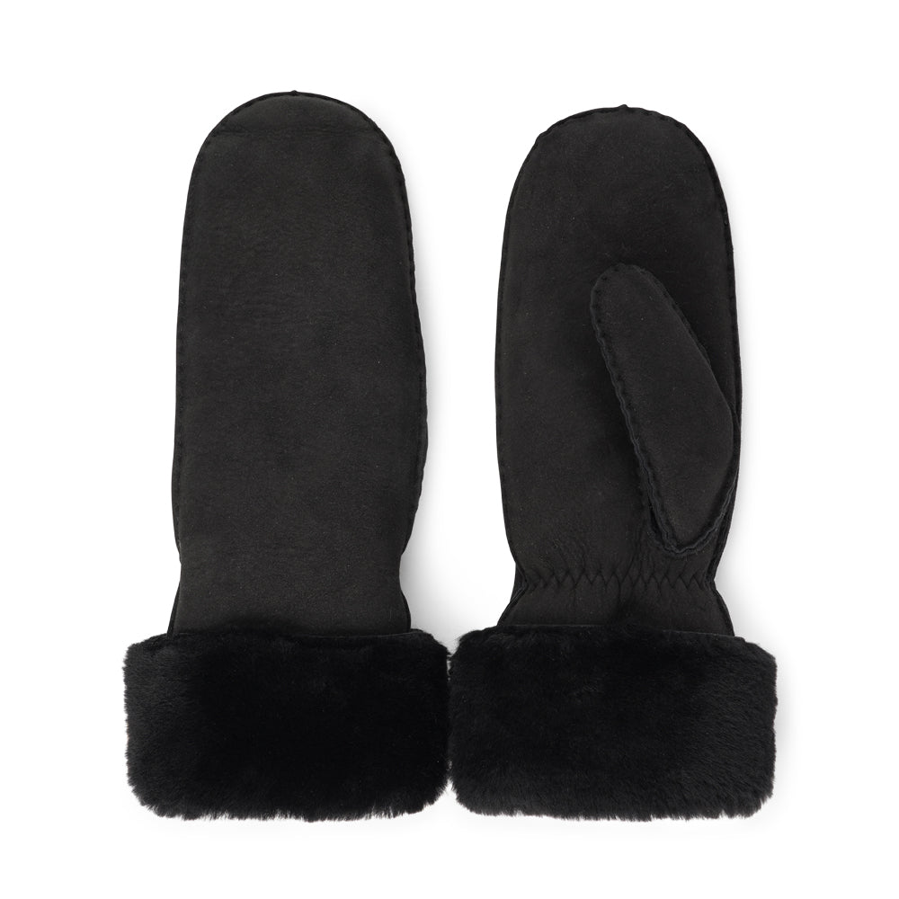 Lovelies Studio -  The Cima Long Shearling Mittens are crafted from 100% Australian double-faced shearling for ultimate warmth. The soft sheepskin palm and upper are complemented by a luxurious cuff and lining made of straight sheep fur.

Designed with an elastic wrist closure, these mittens offer a snug, comfortable fit. You can fold down the shearling cuff and tuck it under your coat sleeves for extra warmth, or wear the mittens over your winter sweater sleeves for added style and coziness.