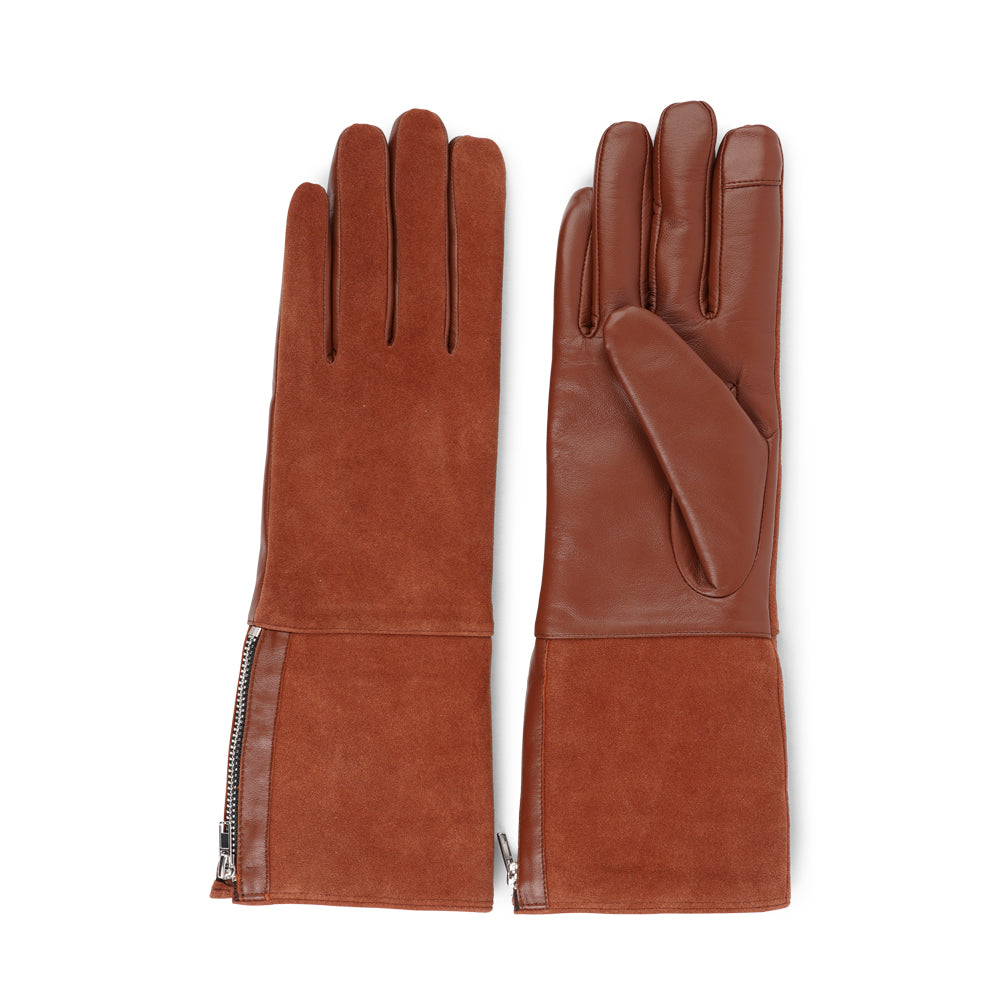 Lovelies Studio - The Cremona gloves combine elegance and warmth, crafted from soft leather with a chic zip detail for a modern touch. Lined with luxurious shearling, these gloves offer superior comfort and insulation.

Their feminine design and refined style make Cremona the perfect accessory for staying stylish in colder weather.