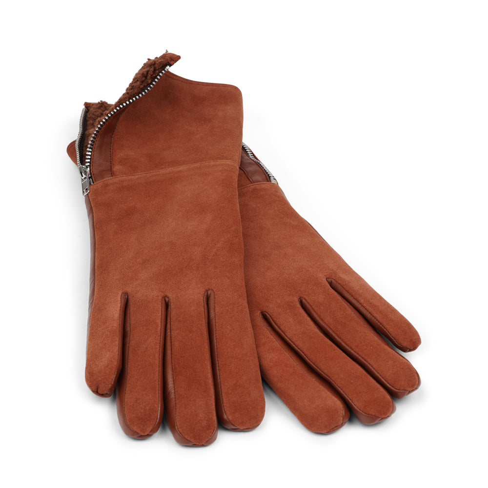 Lovelies Studio - The Cremona gloves combine elegance and warmth, crafted from soft leather with a chic zip detail for a modern touch. Lined with luxurious shearling, these gloves offer superior comfort and insulation.

Their feminine design and refined style make Cremona the perfect accessory for staying stylish in colder weather.