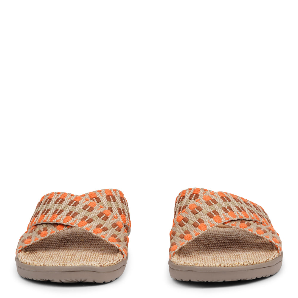 The casual Harmal sandal, a tribute to the breathtaking beach in North Goa that inspires its name.  Step into comfort and style with its unique design, featuring double-layered soft and durable rubber soles. The mid-sole, adorned with natural jute, adds a touch of eco-friendly elegance. Embrace both fashion and comfort as you stroll, thanks to the wide cotton straps intricately woven with captivating patterns, available in a spectrum of colors.