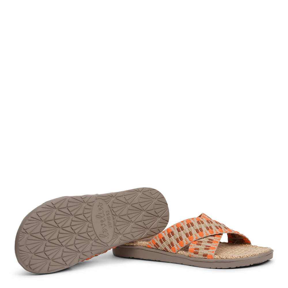 The casual Harmal sandal, a tribute to the breathtaking beach in North Goa that inspires its name.  Step into comfort and style with its unique design, featuring double-layered soft and durable rubber soles. The mid-sole, adorned with natural jute, adds a touch of eco-friendly elegance. Embrace both fashion and comfort as you stroll, thanks to the wide cotton straps intricately woven with captivating patterns, available in a spectrum of colors.