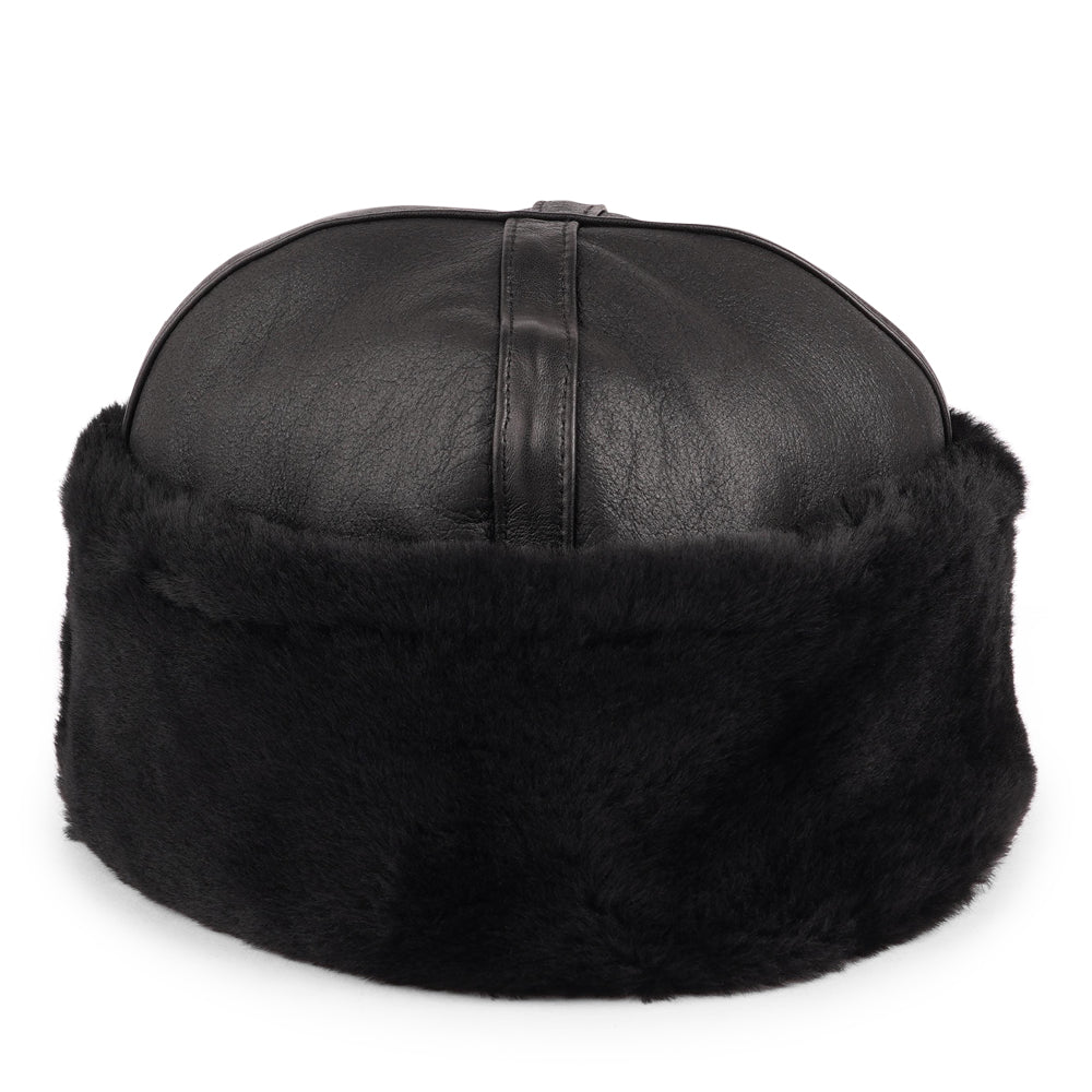 Stay warm and stylish this winter with the Kakani Shearling Hat, a perfect addition to your wardrobe.

Crafted from 100% sheepskin, this hat combines elegance and practicality. The lightweight material provides excellent insulation for cold days and naturally regulates temperature, making it versatile enough to wear into the spring.