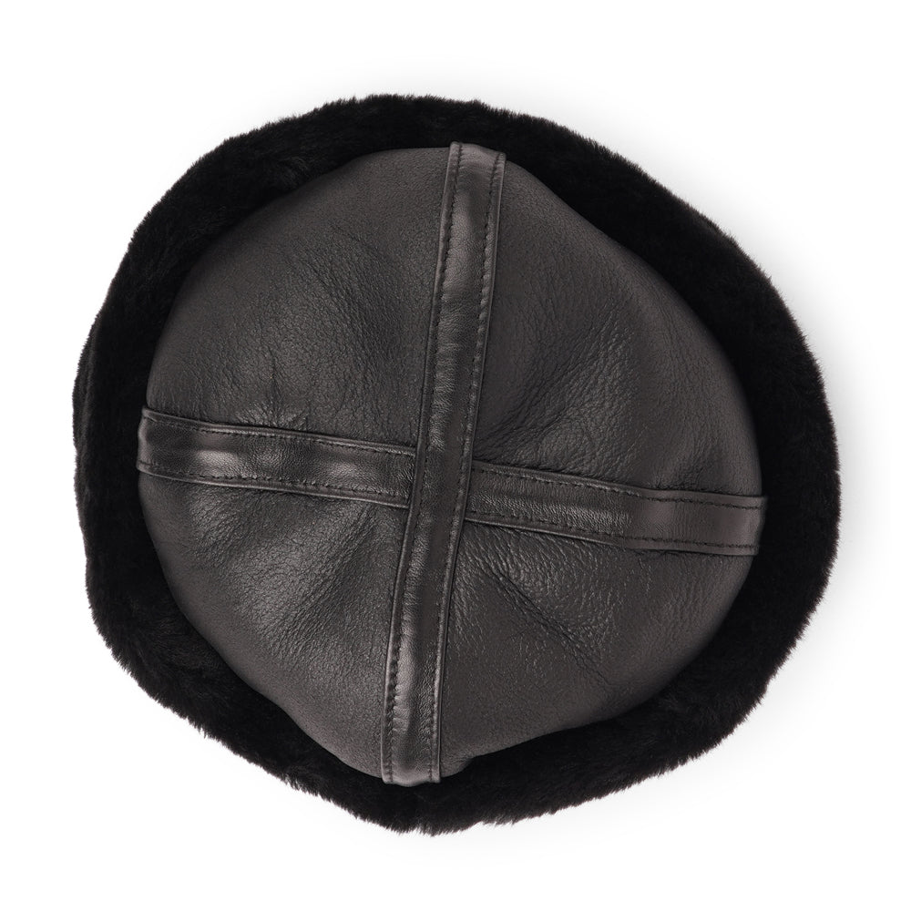 Stay warm and stylish this winter with the Kakani Shearling Hat, a perfect addition to your wardrobe.

Crafted from 100% sheepskin, this hat combines elegance and practicality. The lightweight material provides excellent insulation for cold days and naturally regulates temperature, making it versatile enough to wear into the spring.