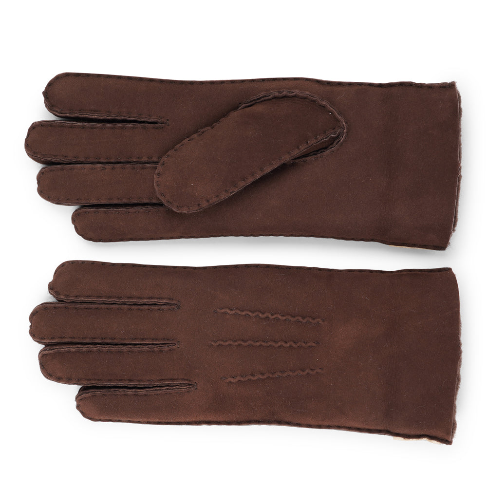 Where Elegance Meets Warmth

Elevate your winter wardrobe with our luxurious Kelly Shearling Gloves. Crafted from supple sheep leather, these gloves are designed to provide you with both style and warmth during the colder months.

These gloves are uniquely long and slim, providing a sleek and feminine silhouette that not only keeps you warm but also adds a chic touch to any outfit.