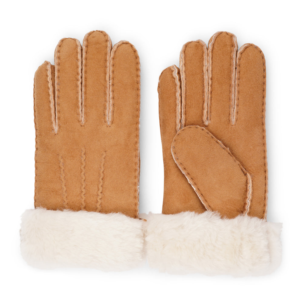 Elevate your winter wardrobe with our luxurious Kelly Shearling Gloves. Crafted from supple sheep leather, these gloves are designed to provide you with both style and warmth during the colder months.

These gloves are uniquely long and slim, providing a sleek and feminine silhouette that not only keeps you warm but also adds a chic touch to any outfit.