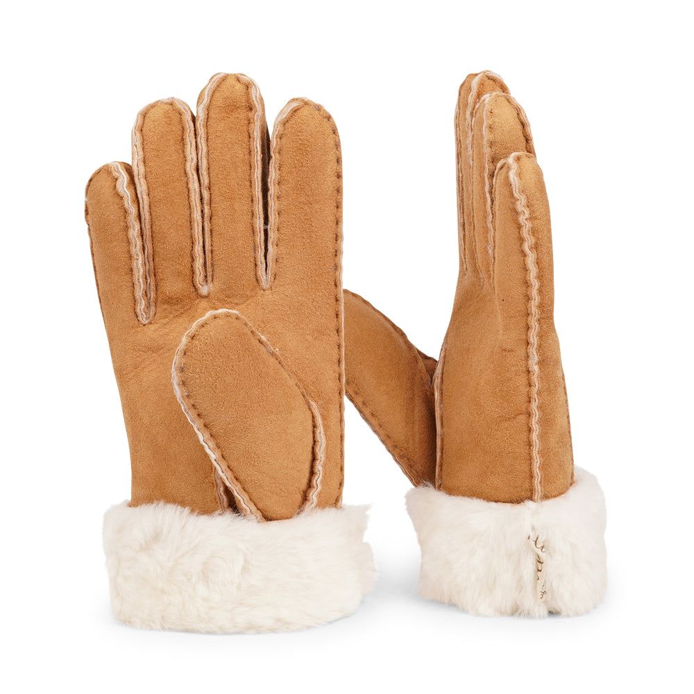 Elevate your winter wardrobe with our luxurious Kelly Shearling Gloves. Crafted from supple sheep leather, these gloves are designed to provide you with both style and warmth during the colder months.

These gloves are uniquely long and slim, providing a sleek and feminine silhouette that not only keeps you warm but also adds a chic touch to any outfit.