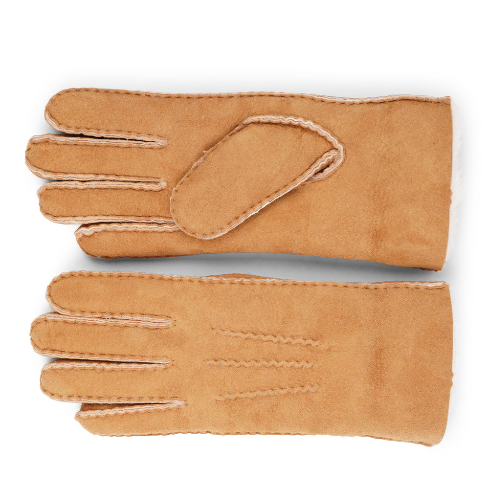 Elevate your winter wardrobe with our luxurious Kelly Shearling Gloves. Crafted from supple sheep leather, these gloves are designed to provide you with both style and warmth during the colder months.

These gloves are uniquely long and slim, providing a sleek and feminine silhouette that not only keeps you warm but also adds a chic touch to any outfit.