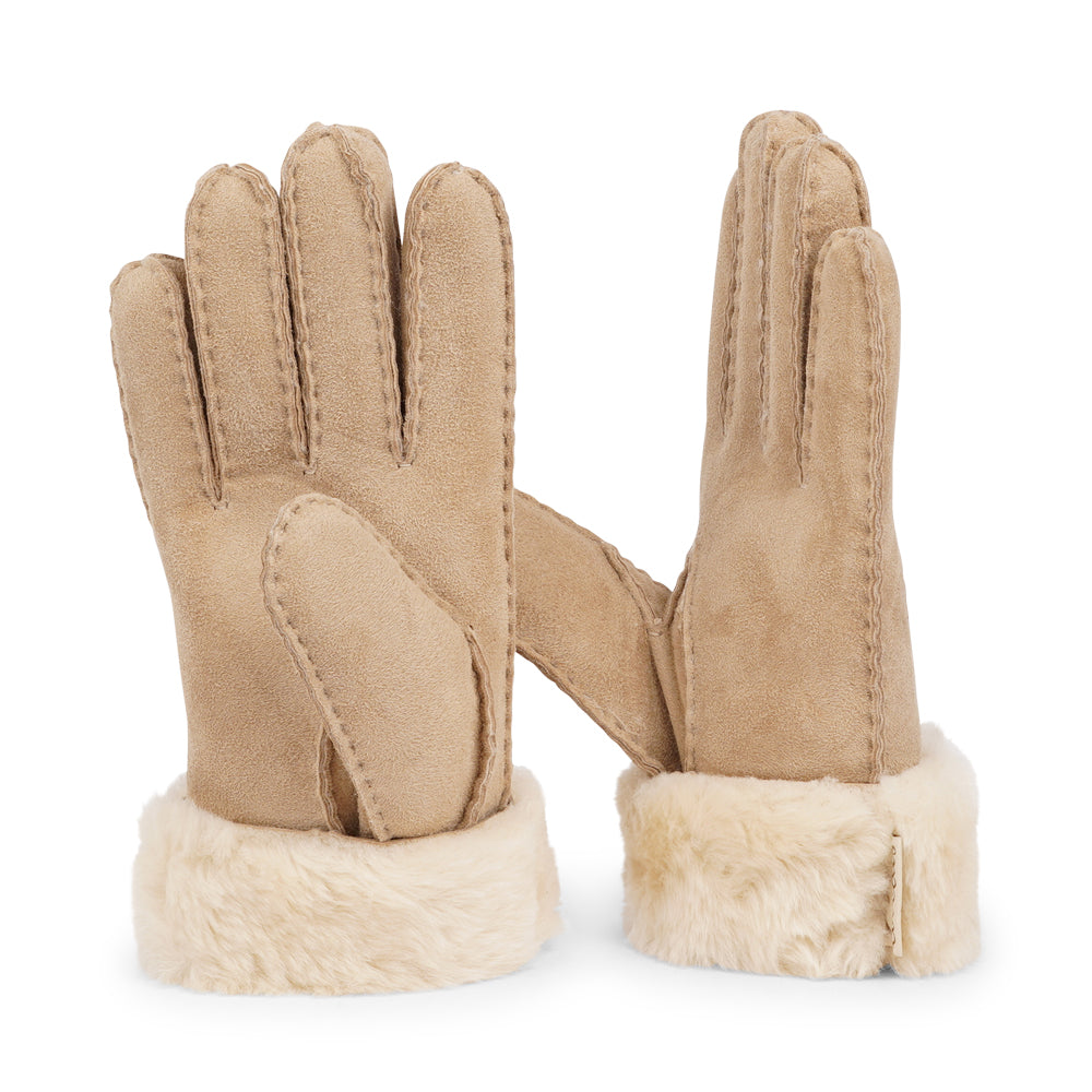 Elevate your winter wardrobe with our luxurious Kelly Shearling Gloves. Crafted from supple sheep leather, these gloves are designed to provide you with both style and warmth during the colder months.

These gloves are uniquely long and slim, providing a sleek and feminine silhouette that not only keeps you warm but also adds a chic touch to any outfit.