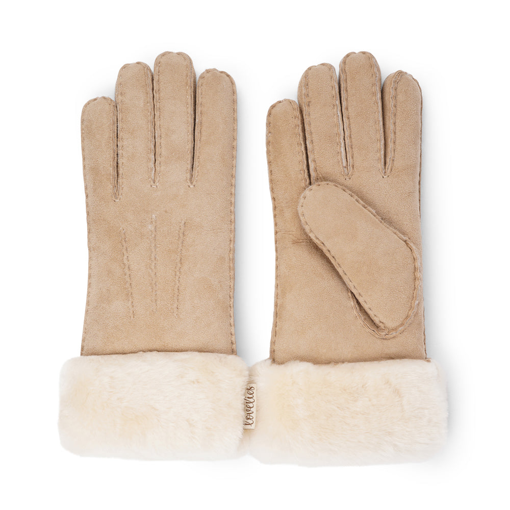 Lovelies Studio - Enhance your winter style with our luxurious Kelly Long Shearling Gloves. Made from soft sheep leather, these gloves offer a perfect blend of sophistication and warmth for the colder seasons.

Their elongated, slim design creates a sleek, feminine silhouette, ensuring you stay cozy while adding a chic, polished finish to any outfit.