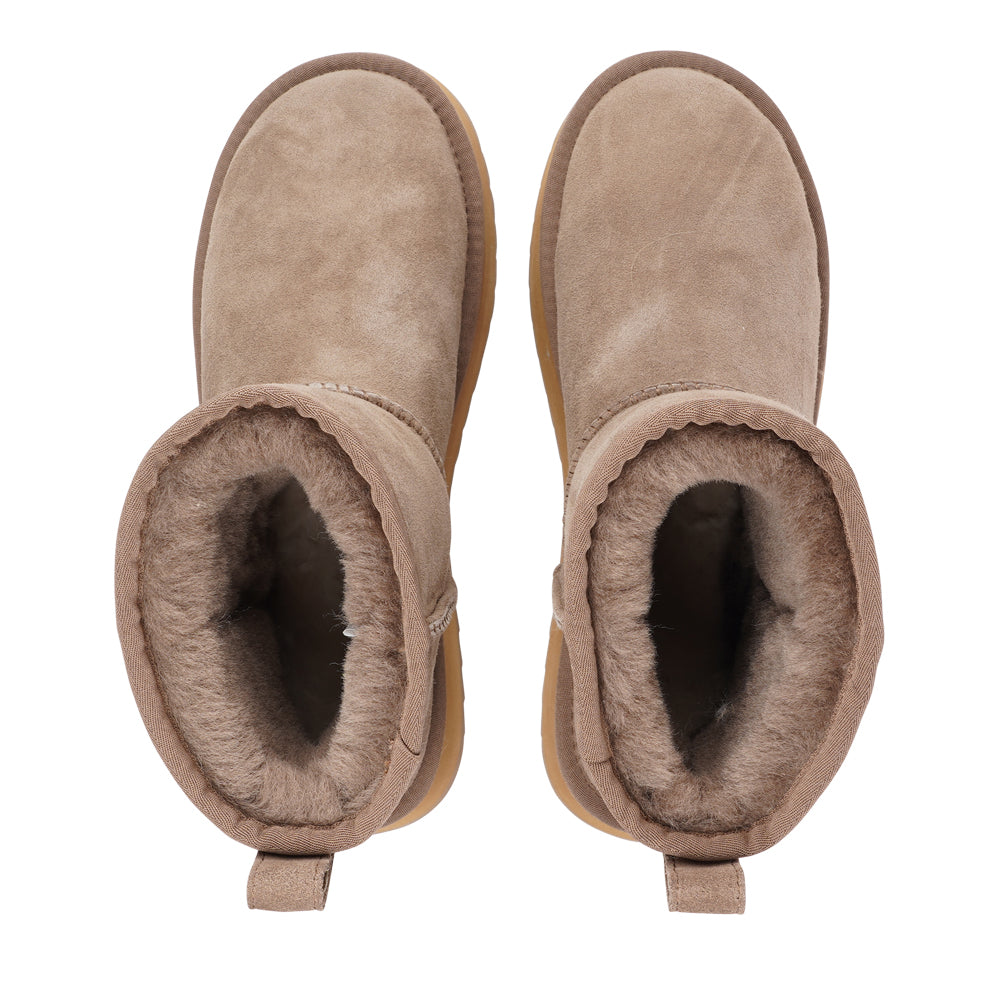 Designed for your ultimate comfort, these luxurious shearling boots are the perfect winter companions. Featuring soft, durable rubber soles, they ensure you can step through the colder months with confidence, keeping your feet well-protected from the elements.&nbsp;

Lovelies Studio - But Laveno offers more than just practicality—these boots blend warmth and style seamlessly, making them as fashionable as they are functional.