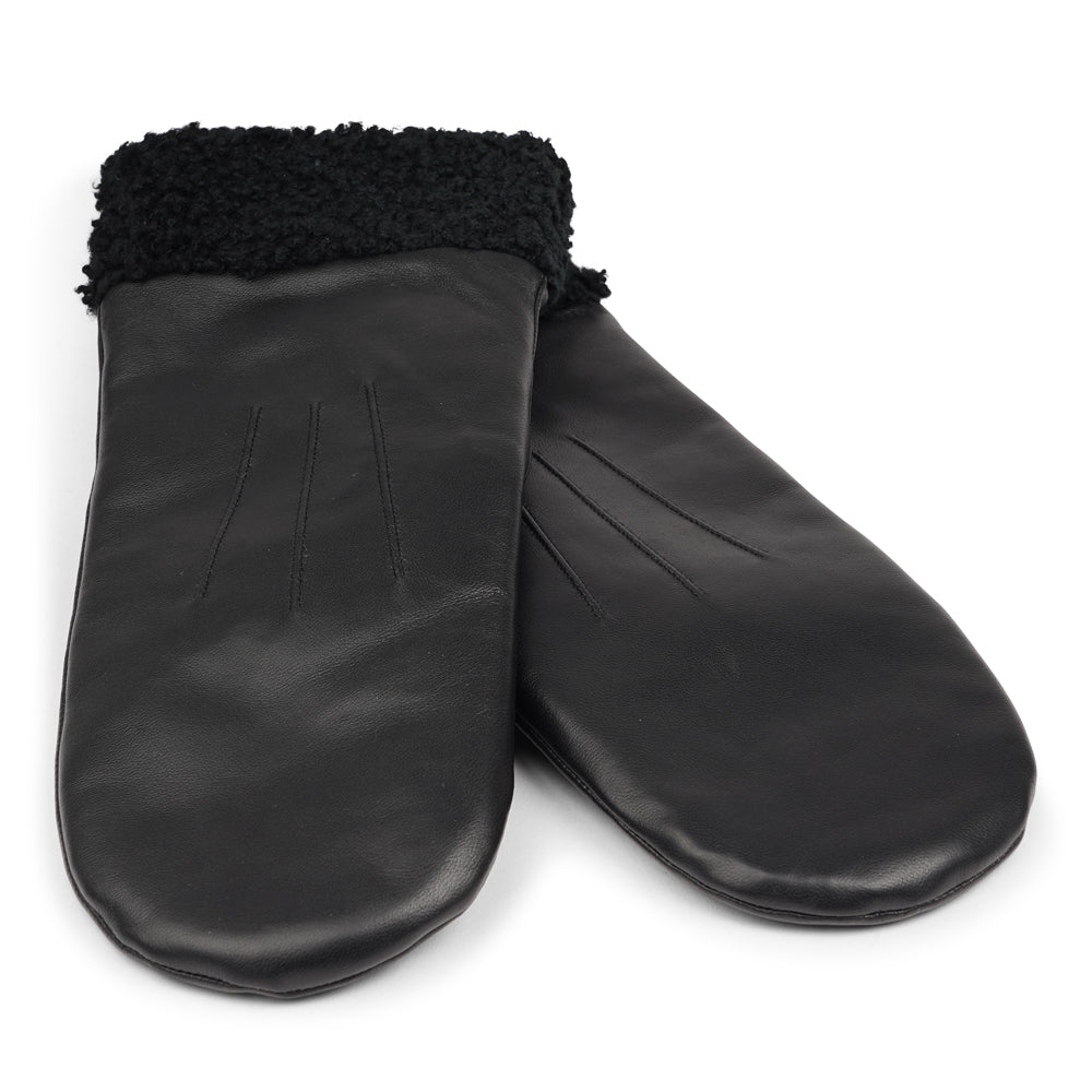 The Matera mittens are a perfect blend of elegance and warmth, crafted from premium leather and lined with soft, curly shearling.

Their feminine design offers both style and comfort, making them an ideal choice for chilly days. With a luxurious feel and timeless look, these mittens are a chic winter essential.