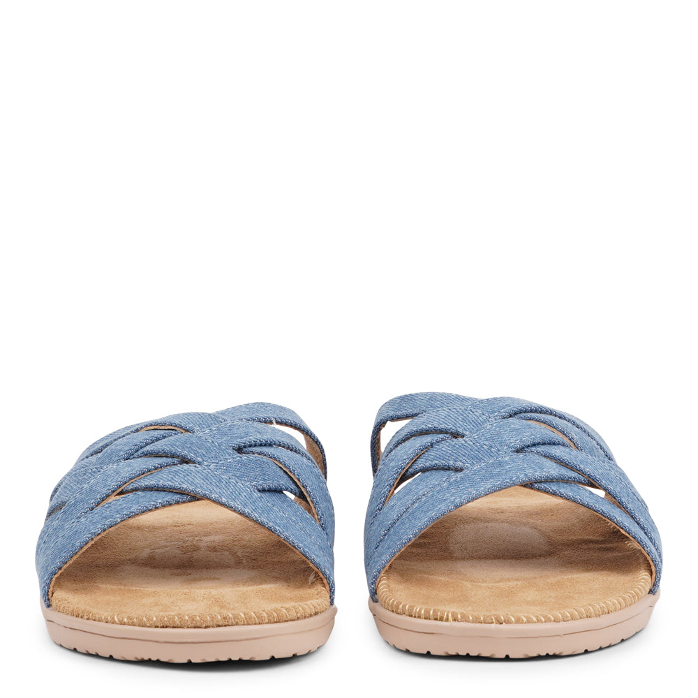 Say hello to the captivating Matara sandal, drawing inspiration from the stunning coasts of Sri Lanka.  This sandal is a luxurious treat, featuring durable rubber embraced by velvety suede. With delicate denim straps adding a playful flair, it effortlessly enhances any ensemble. It's the ultimate blend of chic and trendy style.