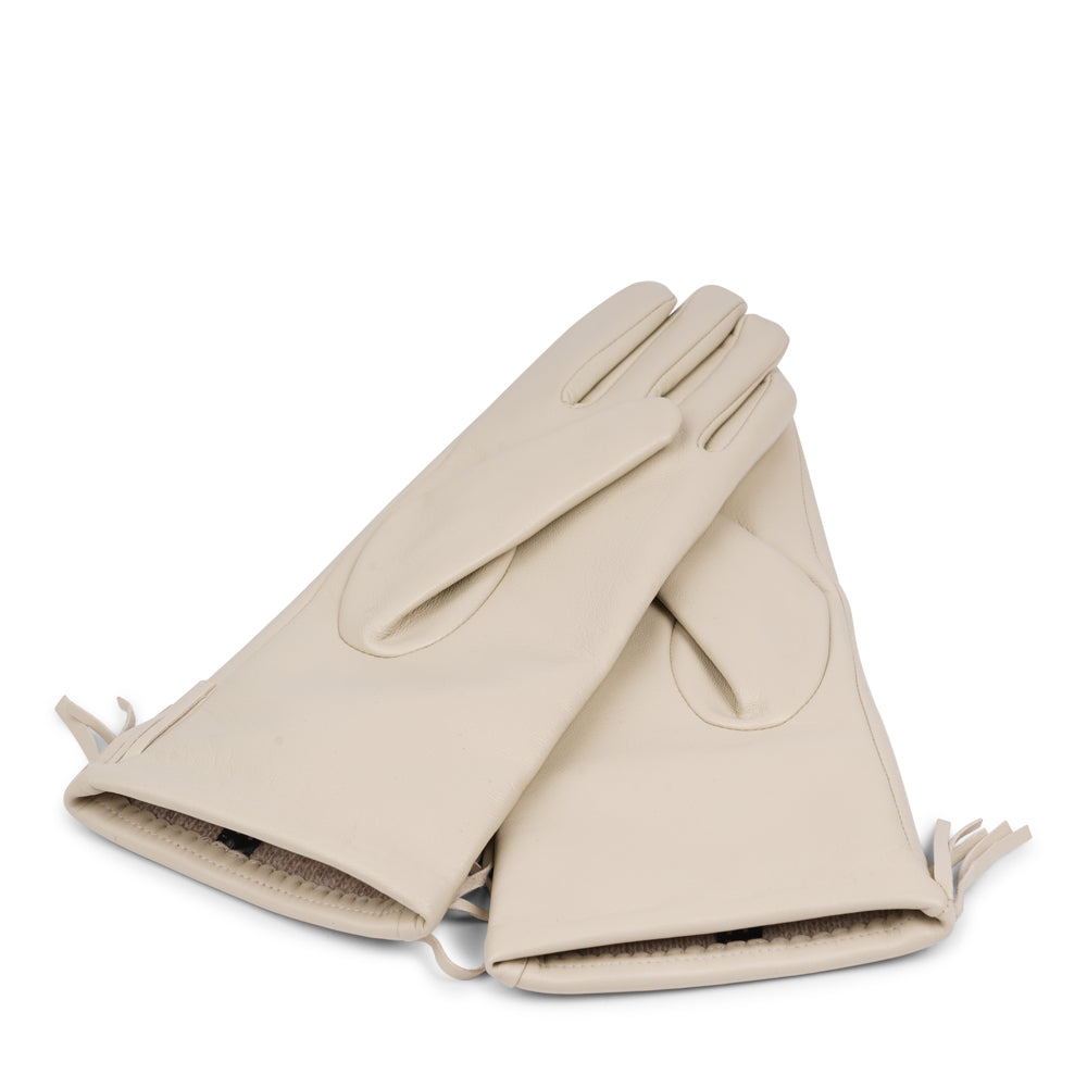 Lovelies Studio - The Pordenone gloves offer a perfect blend of bold style and luxurious comfort. Crafted from premium leather, they feature eye-catching fringe detailing for a unique look.

Lined with soft cashmere, these gloves ensure warmth and elegance, making them a standout accessory for the colder months.