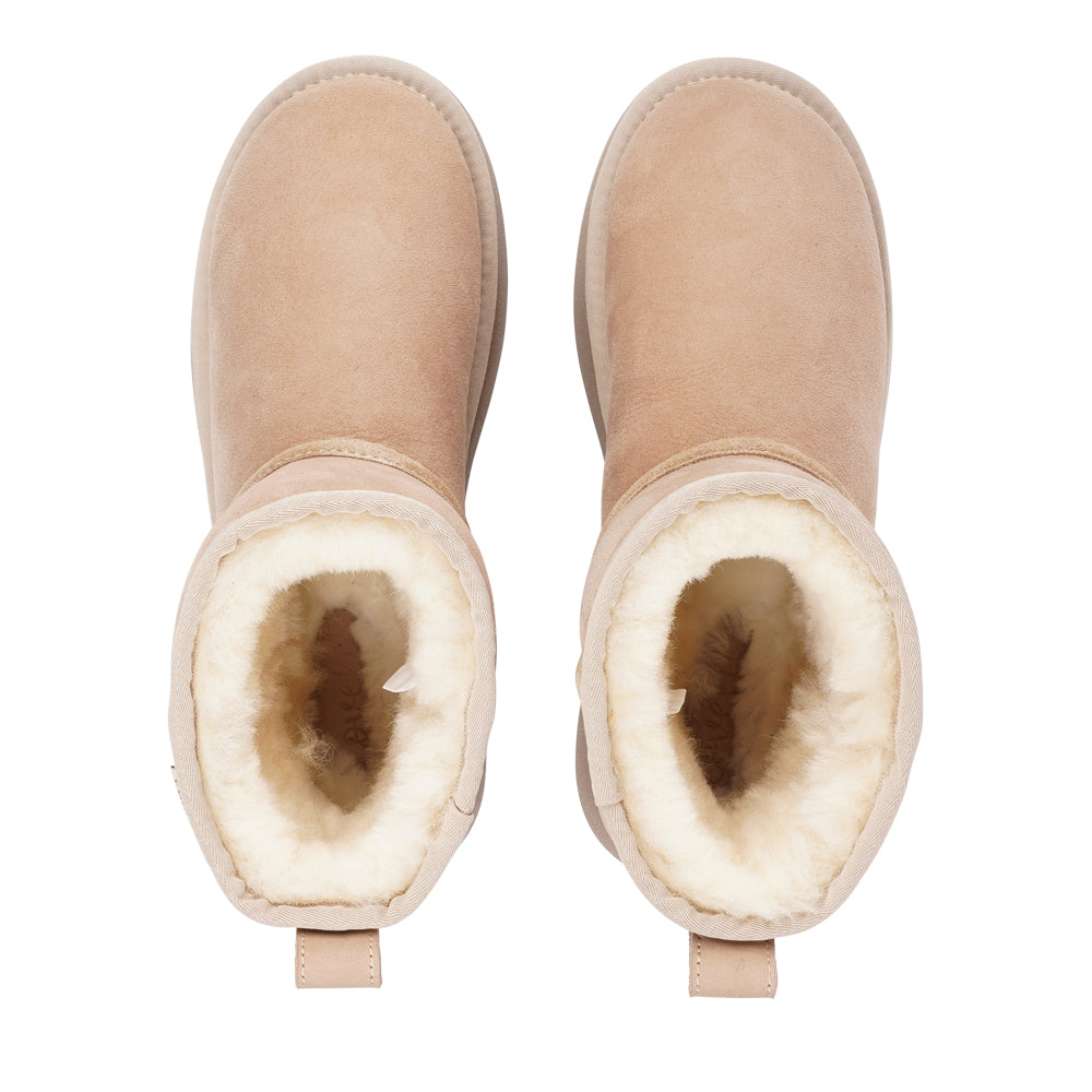 Lovelies Studio - Crafted for unparalleled comfort, these luxurious shearling boots are your perfect winter companion. With soft, durable rubber soles, they provide the confidence to navigate colder months while keeping your feet protected from the elements.

The Prayon boots go beyond mere functionality—effortlessly combining warmth and style, they offer a seamless blend of fashion and practicality.