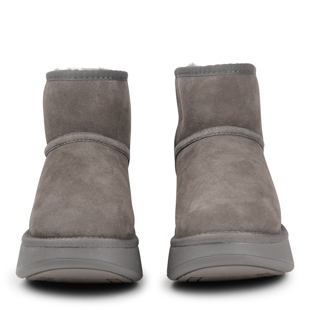 Crafted for unparalleled comfort, these luxurious shearling boots are your perfect winter companion. With soft, durable rubber soles, they provide the confidence to navigate colder months while keeping your feet protected from the elements.

The Prayon boots go beyond mere functionality—effortlessly combining warmth and style, they offer a seamless blend of fashion and practicality.