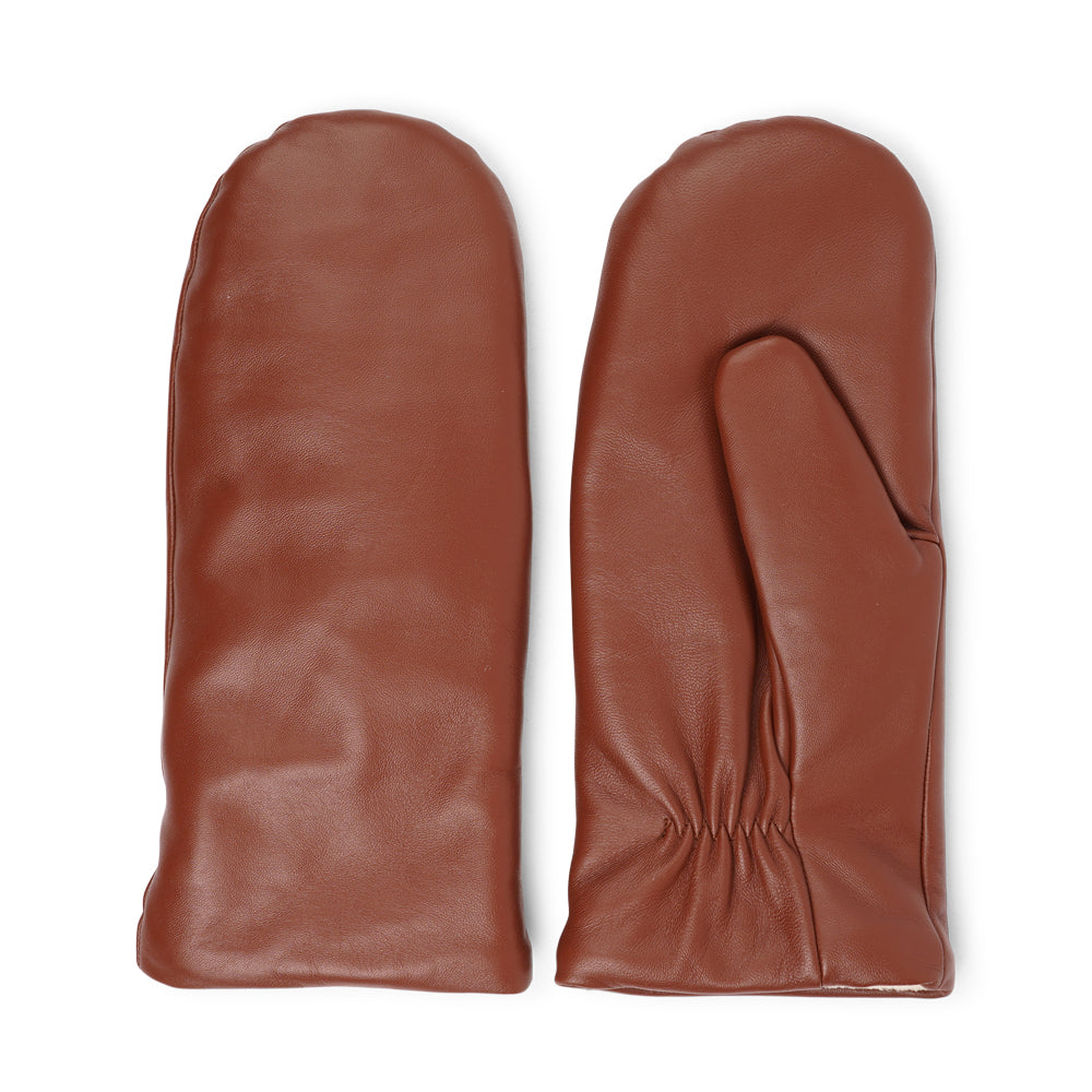 The Ravenna mittens are crafted from premium leather and feature a plush fleece lining for exceptional warmth and comfort.

With their sophisticated design and luxurious materials, these mittens offer both style and practicality, making them an essential accessory for chilly weather.