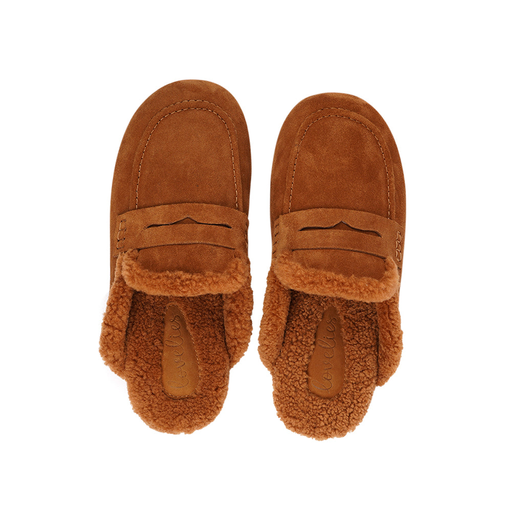 Lovelies Studio - Denmark - Designed to envelop your feet in cozy warmth, these mules offer an unbeatable blend of plushness and support. The durable rubber sole ensures long-lasting comfort and resilience, making them the perfect companion for chilly days. Treat your feet to the luxury they deserve.