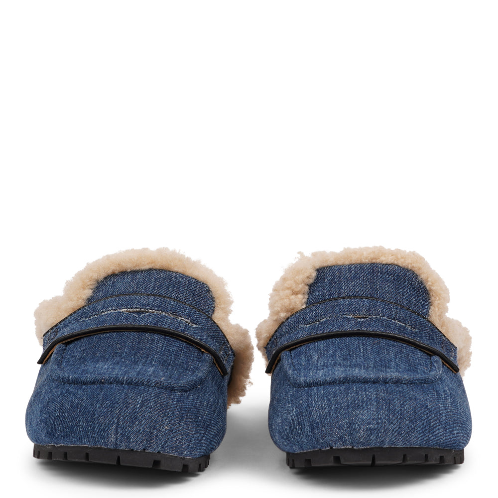 Lovelies  Studio - Designed to envelop your feet in cozy warmth, these mules offer an unbeatable blend of plushness and support. The durable rubber sole ensures long-lasting comfort and resilience, making them the perfect companion for chilly days. Treat your feet to the luxury they deserve.