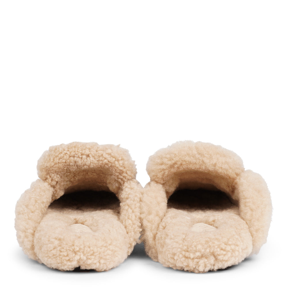 Lovelies  Studio - Designed to envelop your feet in cozy warmth, these mules offer an unbeatable blend of plushness and support. The durable rubber sole ensures long-lasting comfort and resilience, making them the perfect companion for chilly days. Treat your feet to the luxury they deserve.