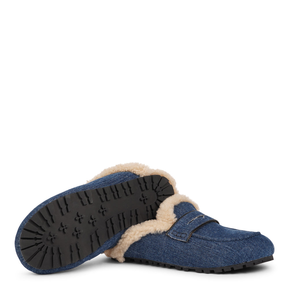 Lovelies  Studio - Designed to envelop your feet in cozy warmth, these mules offer an unbeatable blend of plushness and support. The durable rubber sole ensures long-lasting comfort and resilience, making them the perfect companion for chilly days. Treat your feet to the luxury they deserve.