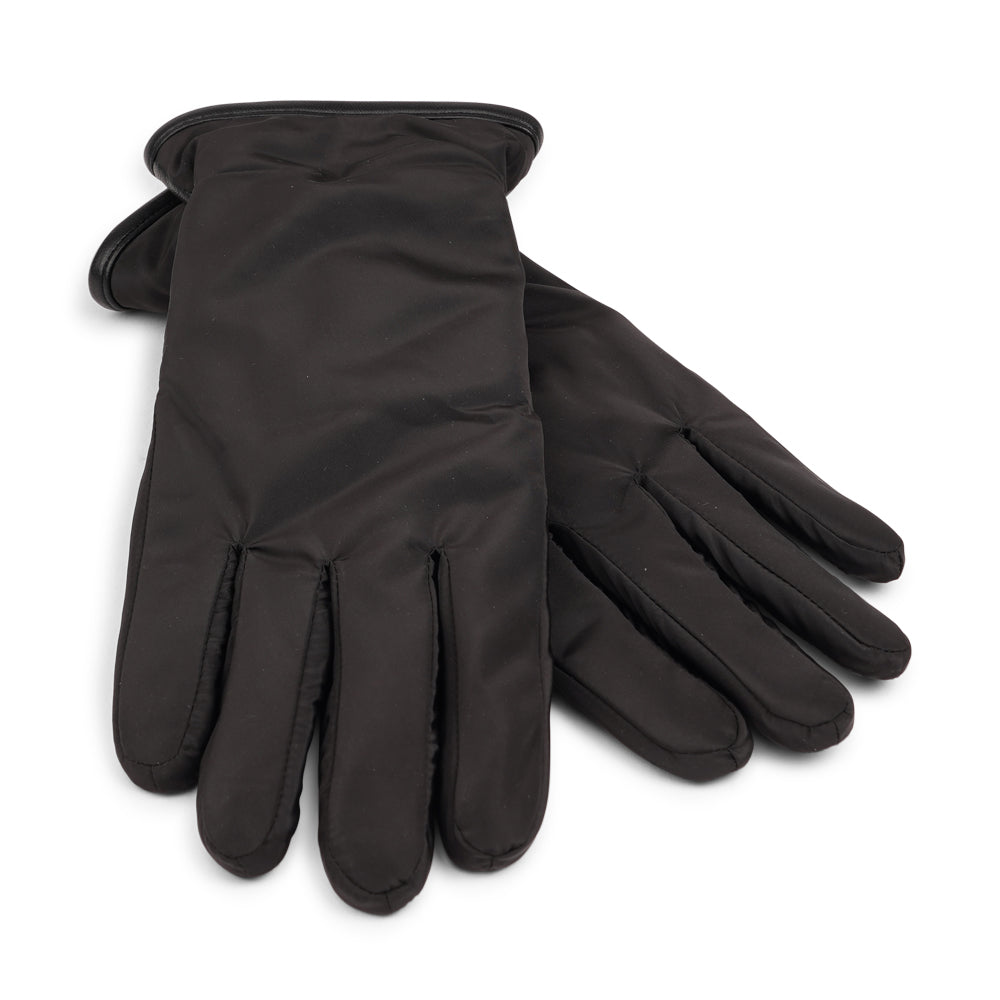 Lovelies Studio - The Sandria gloves combine functionality and luxury with their insulated nylon exterior and plush fleece lining. The fine lambskin palm adds a touch of sophistication and ensures a comfortable grip.

Perfect for staying warm and stylish, Sandria offers both protection and elegance in colder weather.