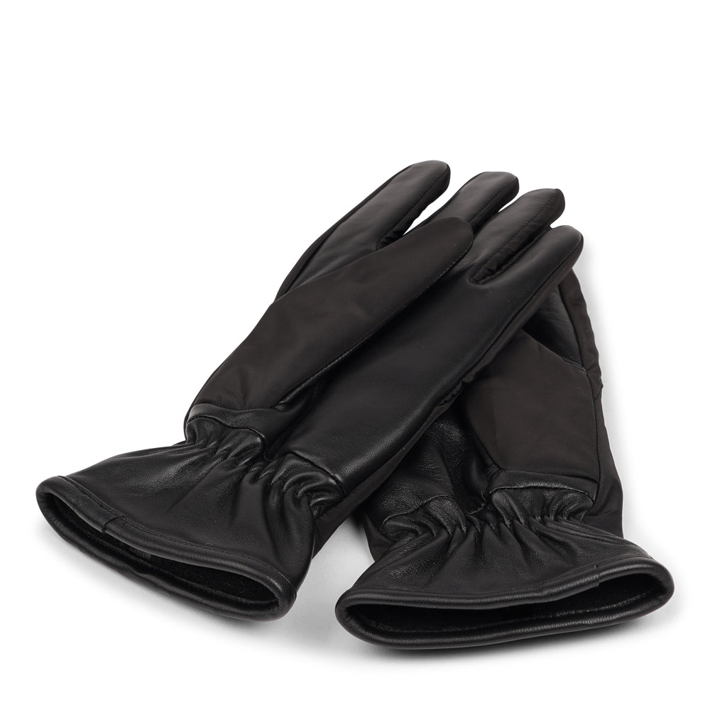 Lovelies Studio - The Sandria gloves combine functionality and luxury with their insulated nylon exterior and plush fleece lining. The fine lambskin palm adds a touch of sophistication and ensures a comfortable grip.

Perfect for staying warm and stylish, Sandria offers both protection and elegance in colder weather.