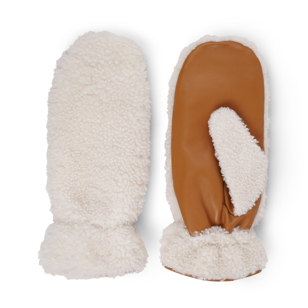 The Siena mittens combine the best of both worlds with a soft shearling exterior and durable leather palms for added grip. Lined with plush shearling, these mittens provide exceptional warmth and comfort in cold weather.

Their timeless design and premium materials make Siena a stylish and practical choice for winter days.