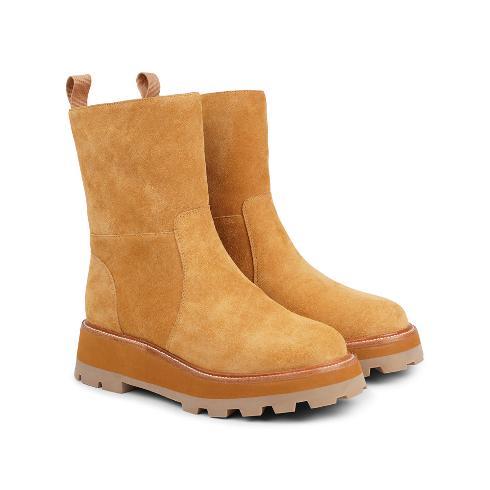 Brave the elements with confidence, thanks to Ushba's high and durable rubber sole. These boots provide unbeatable traction and support, making them the perfect companion for navigating snowy sidewalks and icy paths.