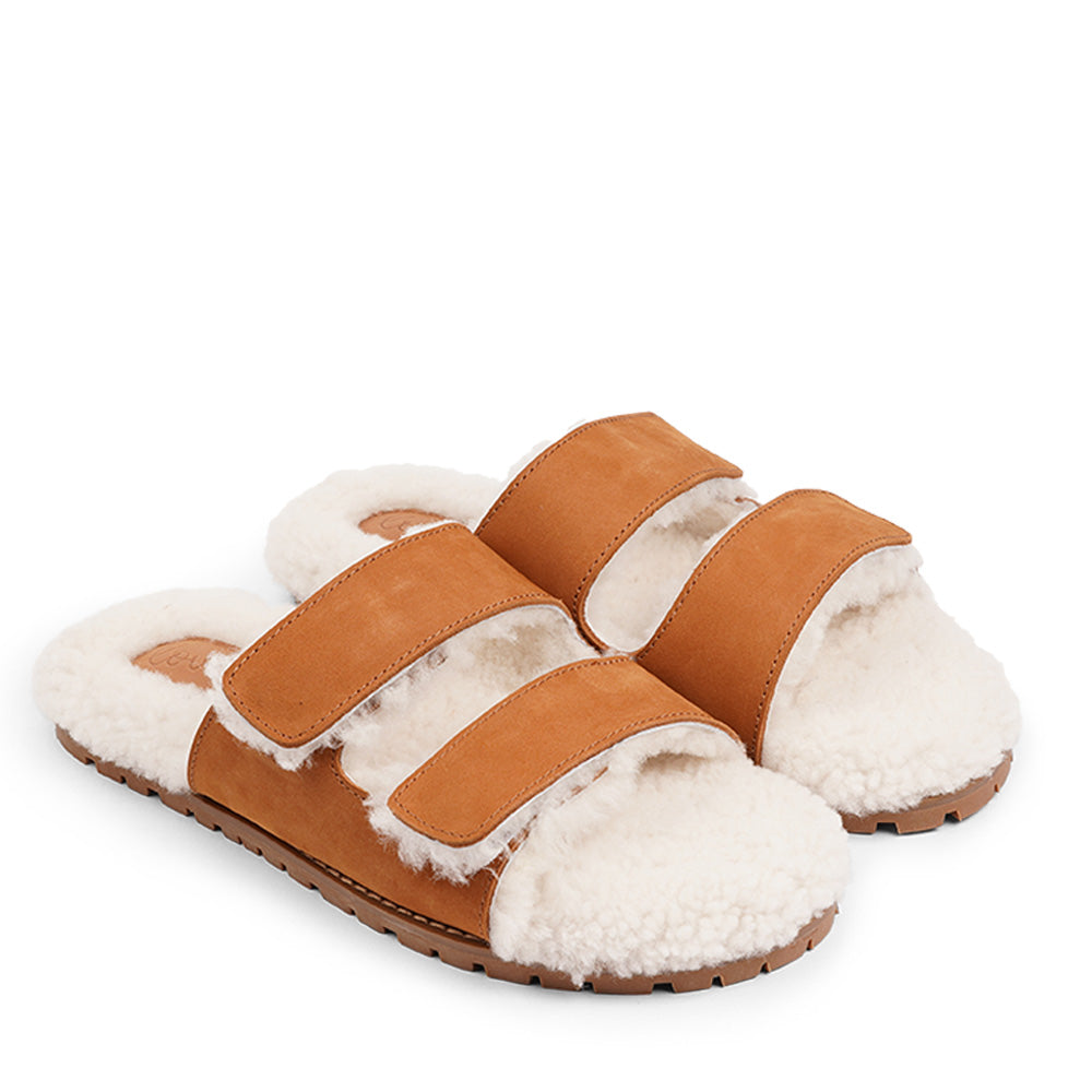 Lovelies Studio - Adjustable Nubuck sandals with shearling lining  Lovelies shearling sandals will bring softness and warmth to your feet this autumn. The combination of soft shearling and rubber sole guarantees the utmost comfort to the wearer. Lovelies Studio is a Danish brand.