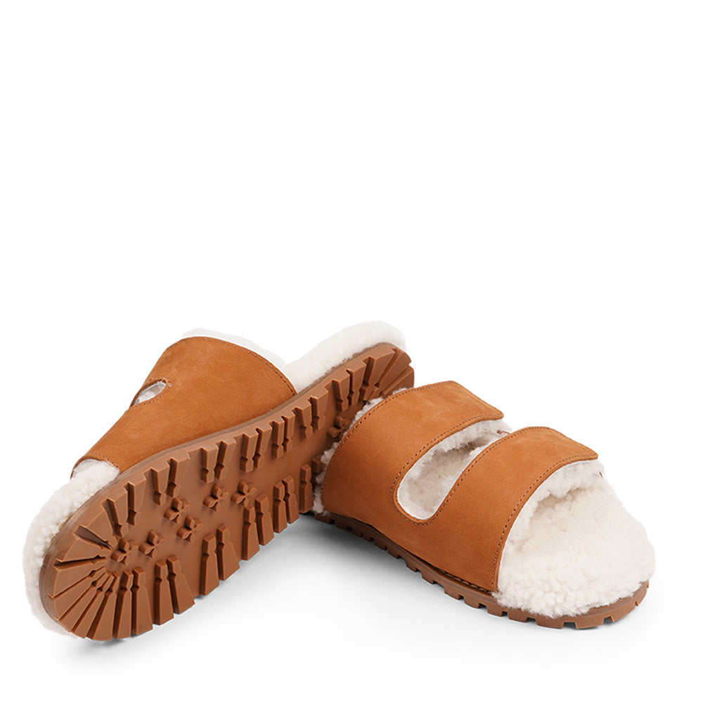 Lovelies Studio - Adjustable Nubuck sandals with shearling lining  Lovelies shearling sandals will bring softness and warmth to your feet this autumn. The combination of soft shearling and rubber sole guarantees the utmost comfort to the wearer. Lovelies Studio is a Danish brand.