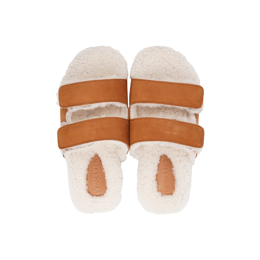 Lovelies Studio - Adjustable Nubuck sandals with shearling lining  Lovelies shearling sandals will bring softness and warmth to your feet this autumn. The combination of soft shearling and rubber sole guarantees the utmost comfort to the wearer. Lovelies Studio is a Danish brand.